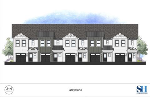 a rendering of a three story building with a garage in front of it
