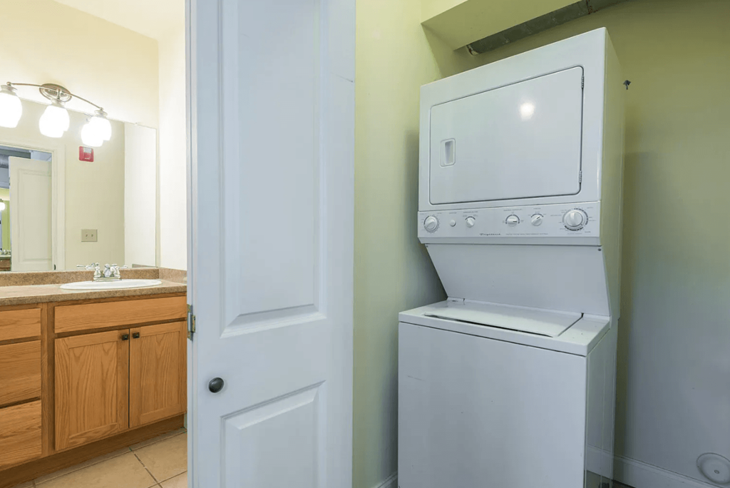a washer and dryer in a bathroom