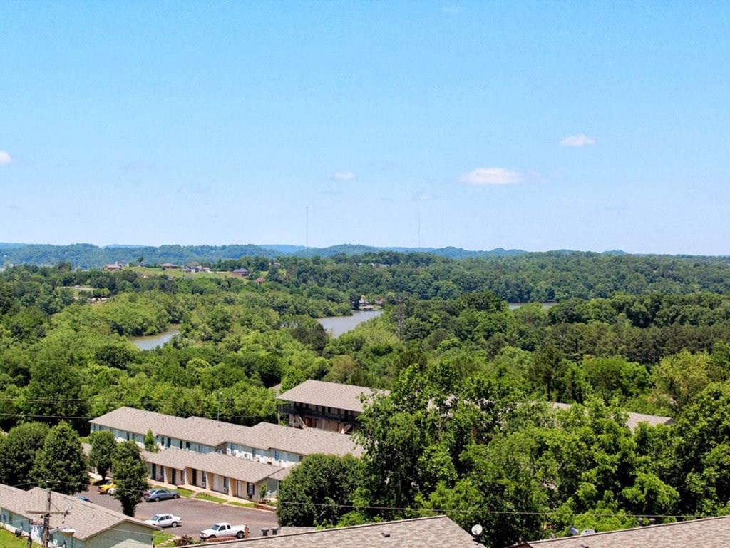 the view of the city from the roof of a building