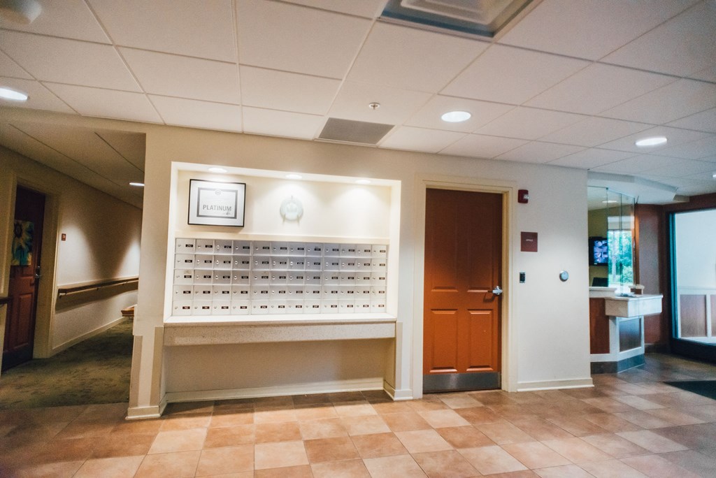 mailboxes and front entrance to apartment community