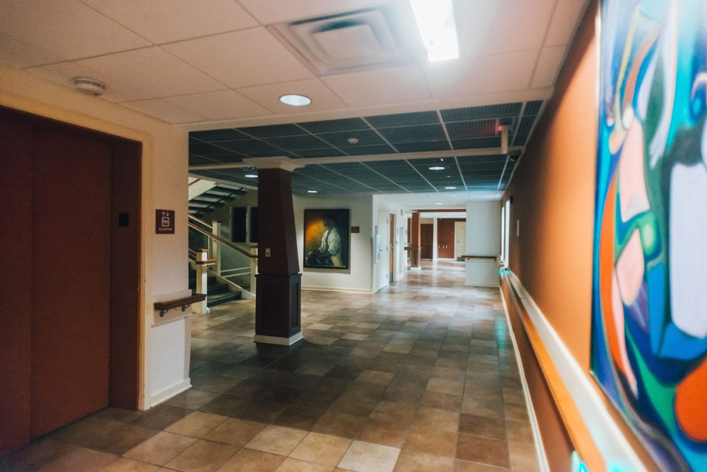 apartment community hallway with mural
