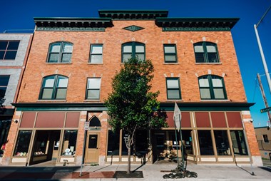 brick building with green trim