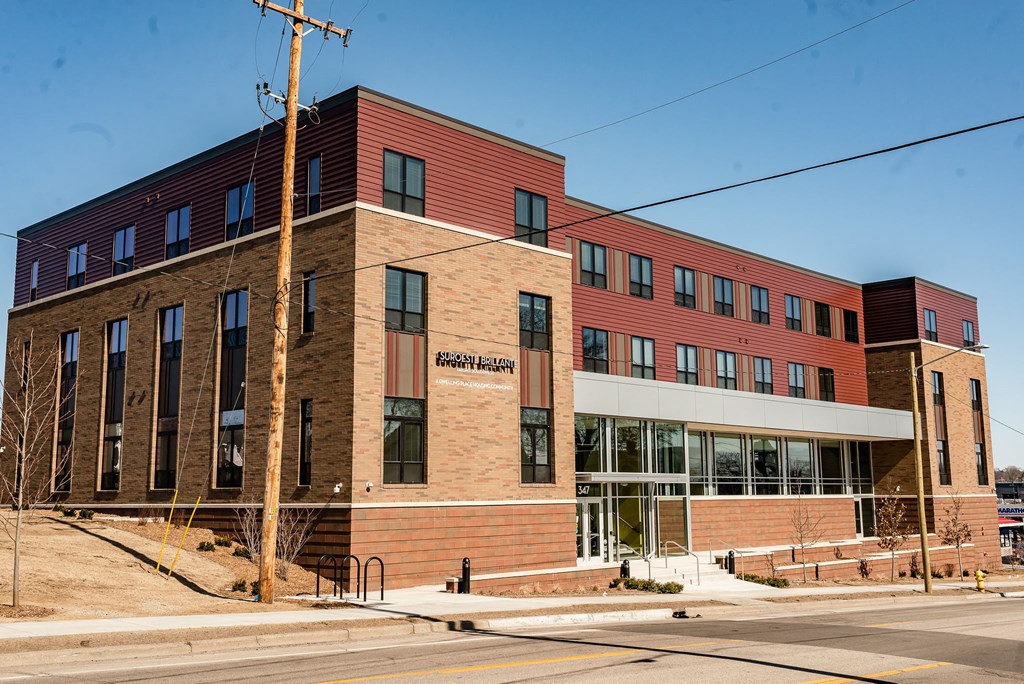 Brick and siding newly completed apartment building