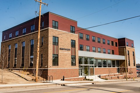 Brick and siding newly completed apartment building