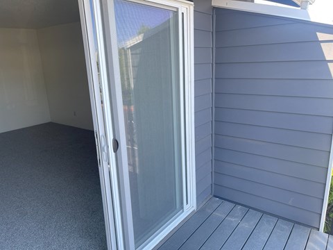 A sliding glass door on a house.