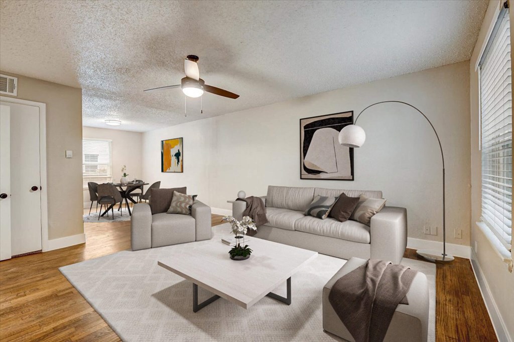 a living room with a couch and a table