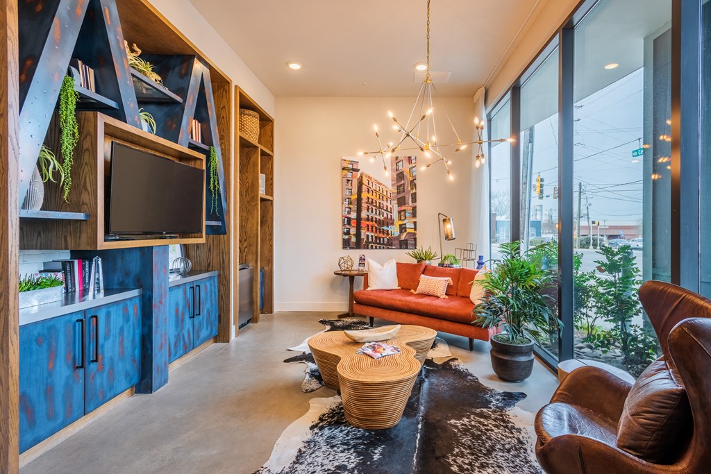 a living room with a couch and a tv