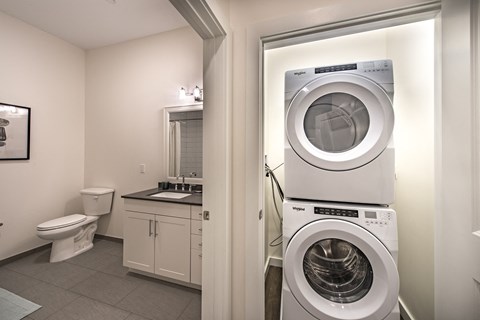 a washer and dryer in a bathroom