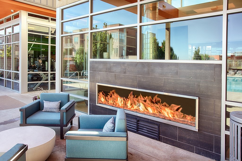 Outdoor lounge area with fire place
