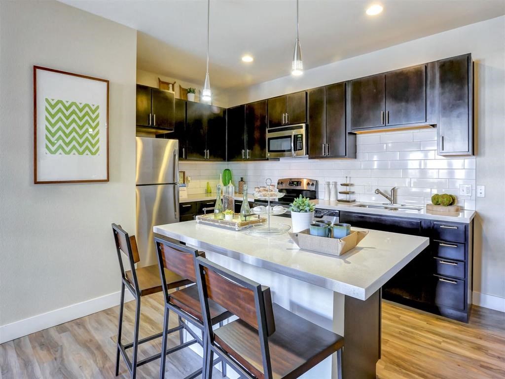 Kitchen with a large center island at Pearl DTC, Denver, CO, 80237