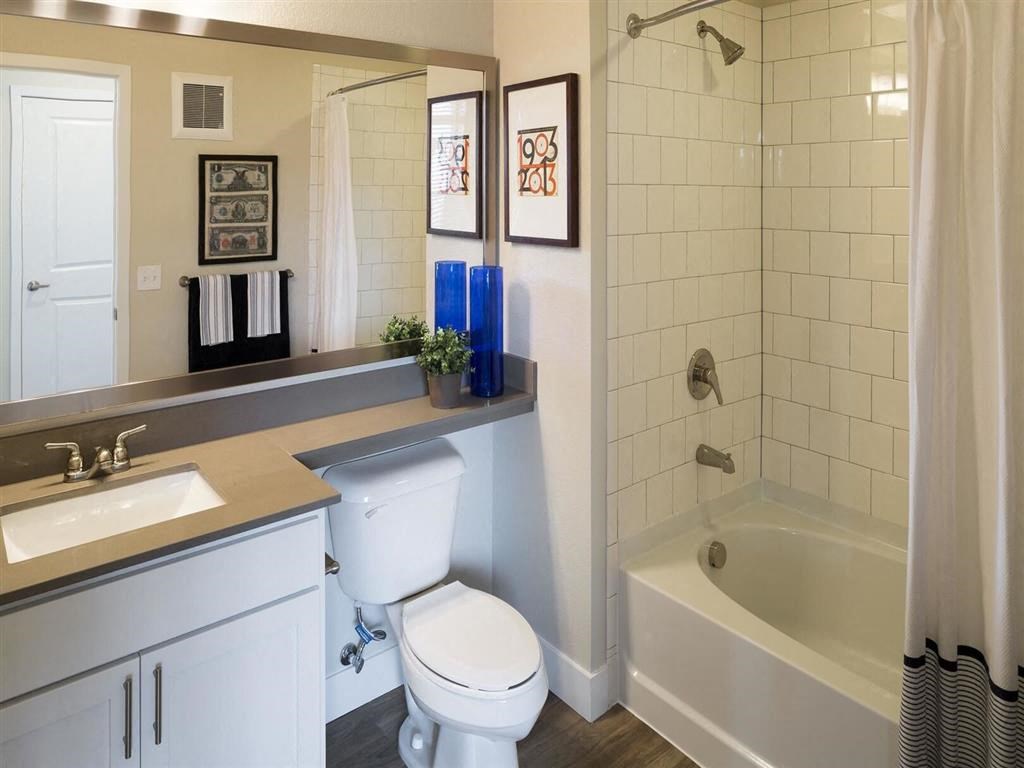 Bathroom with a toilet sink and bathtub at Pearl DTC, Denver, Colorado