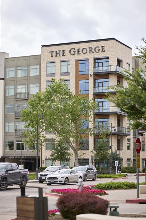 the georgie building on the corner of a city street