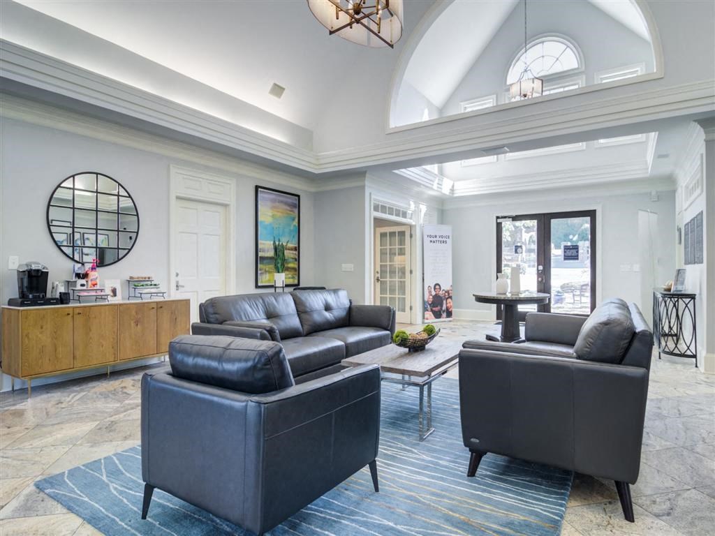 a living room with couches and a coffee table