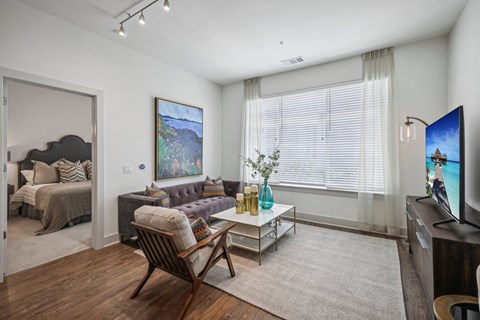 a living room with a couch and a coffee table