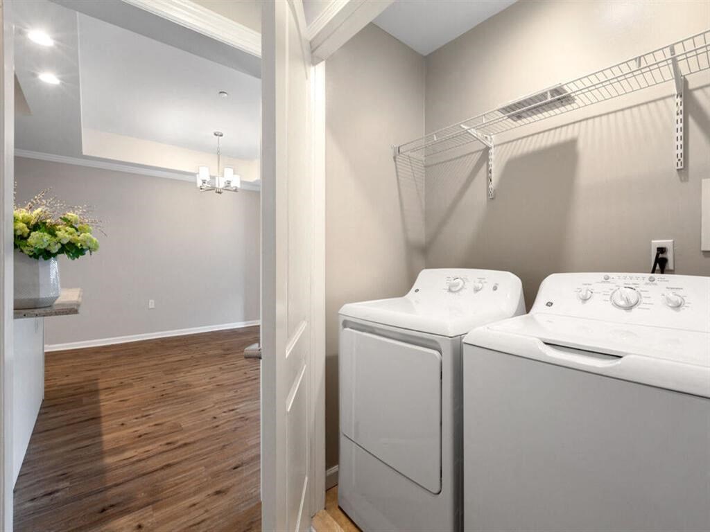 a white washer and dryer in a room
