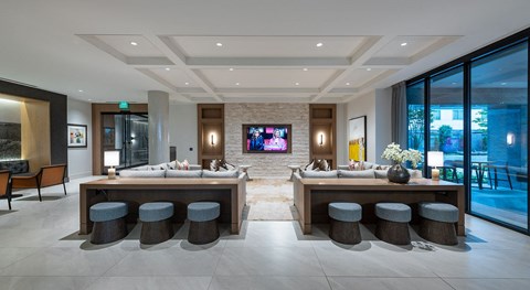 a living room with a bar and a television