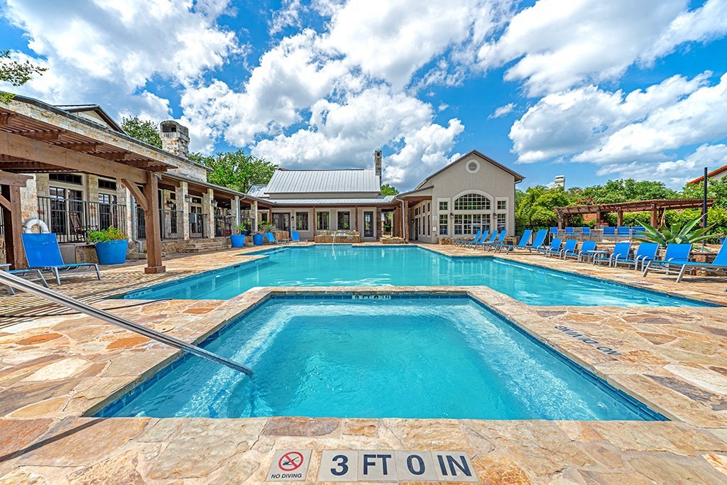 A pool with a 3 foot deep sign in the middle.