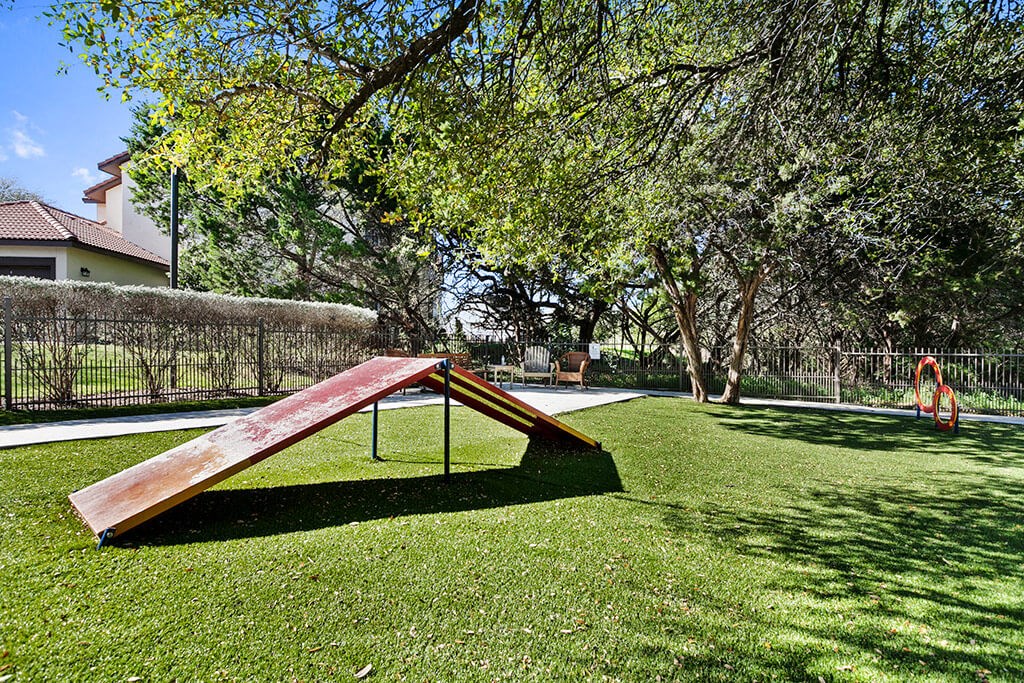 a skateboard ramp in the backyard of a park