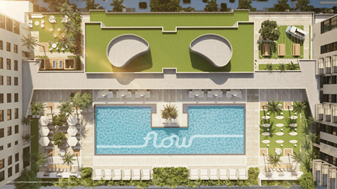 A modern building with a pool and a green roof.
