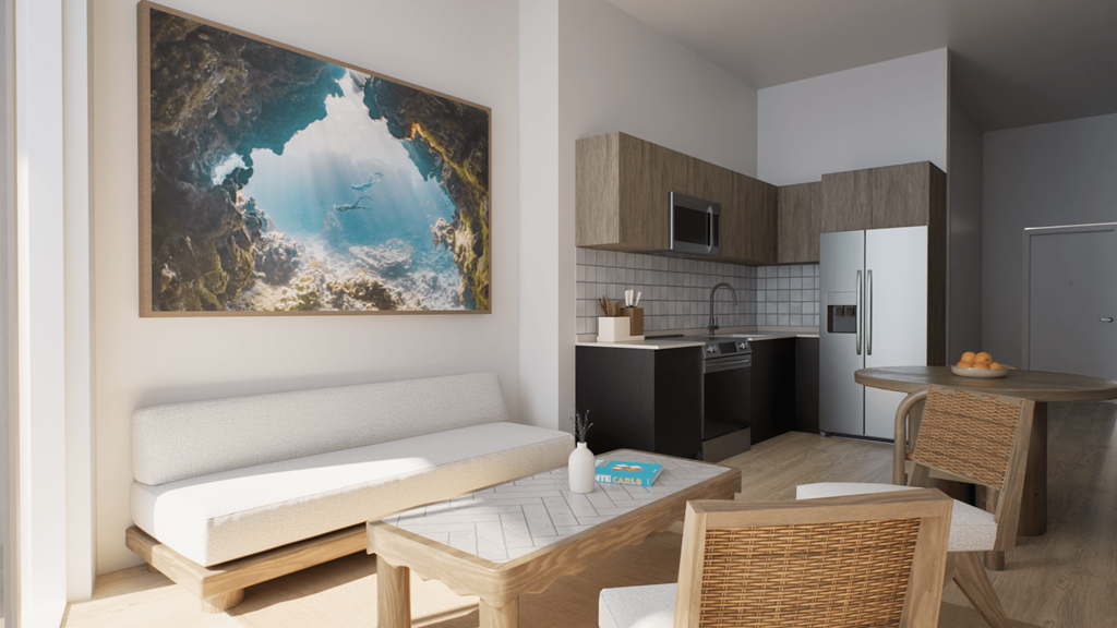 A modern kitchen with a painting of a mountain landscape on the wall.