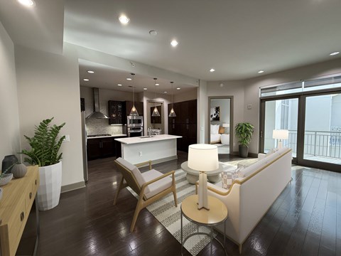 A modern living room with a white sofa and wooden chairs.