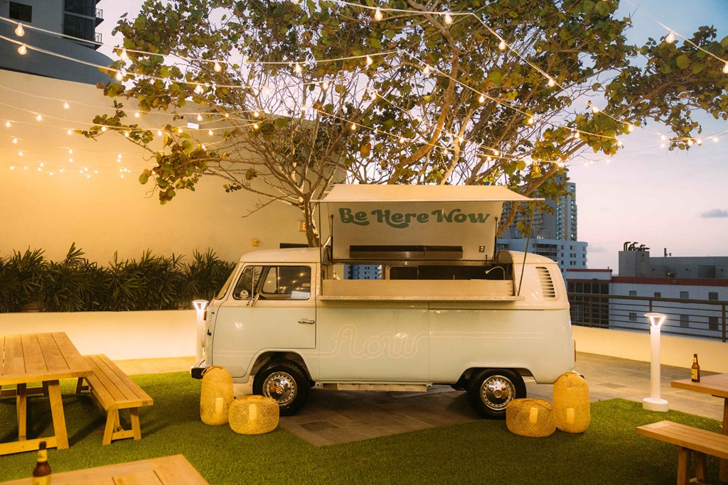 a white van parked in front of a building
