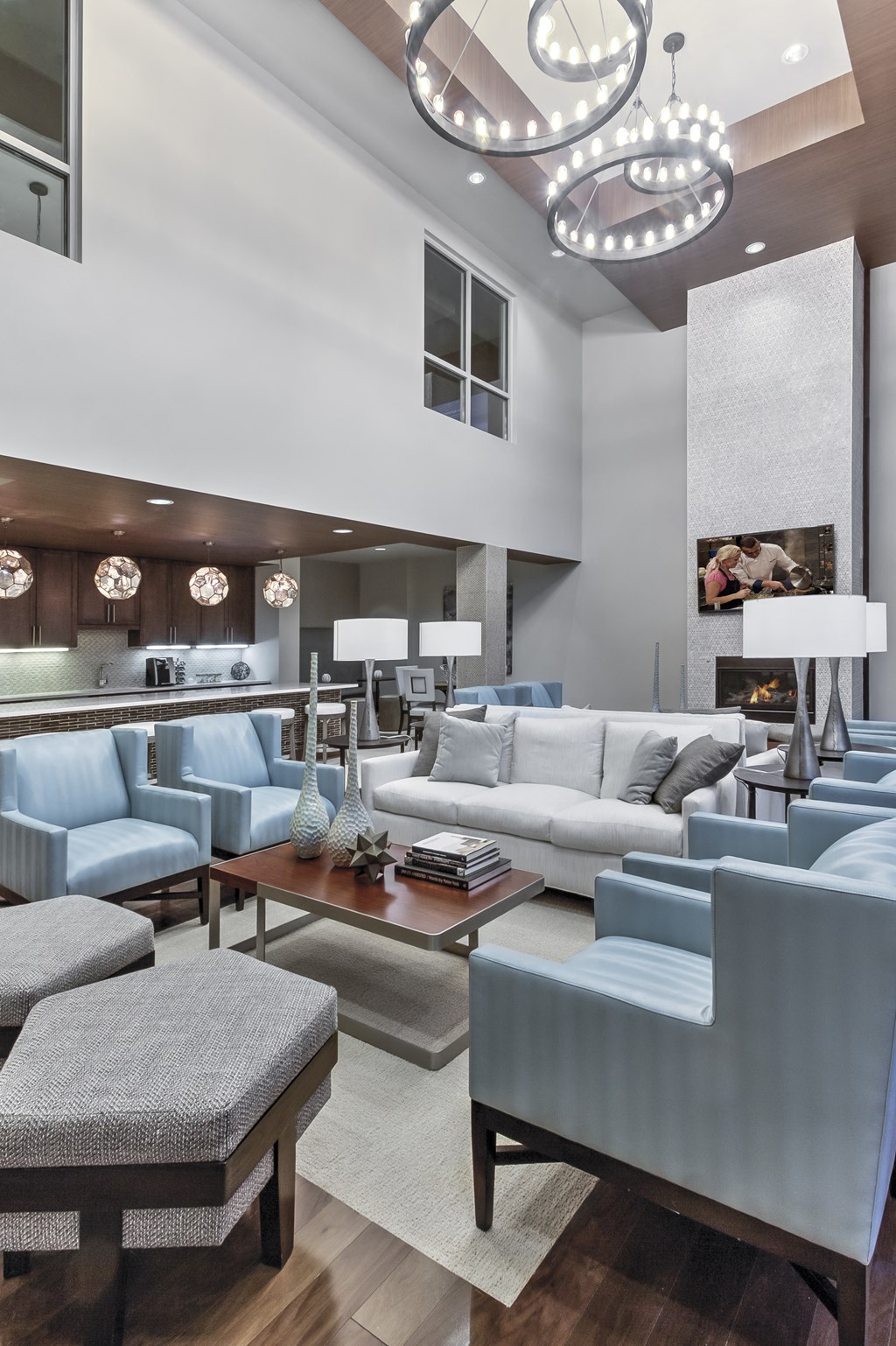 a living room filled with furniture and a fire place