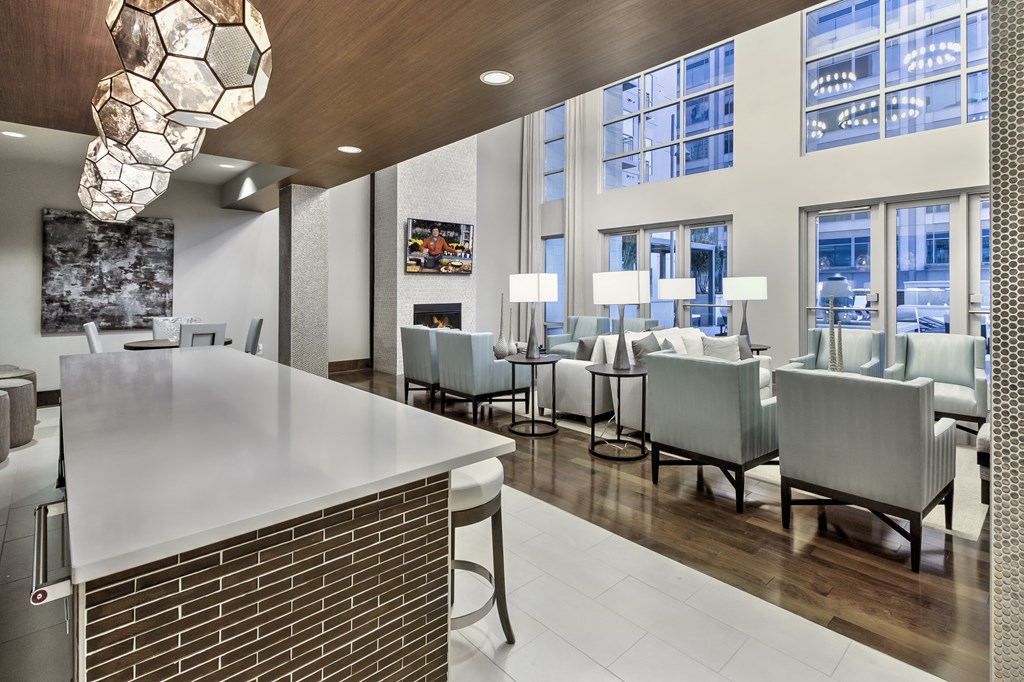 a room filled with furniture and a large window