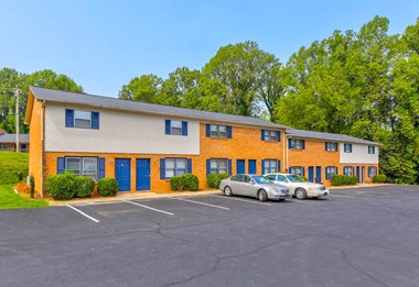 Building view with parking area.