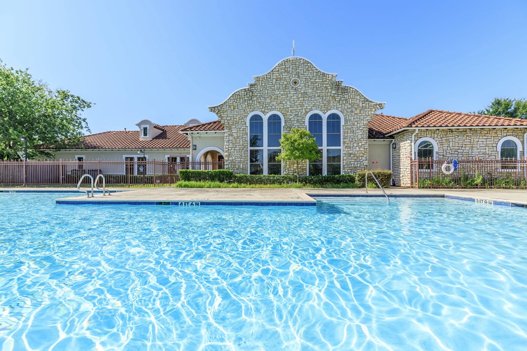 the swimming pool at the villas at stone creek