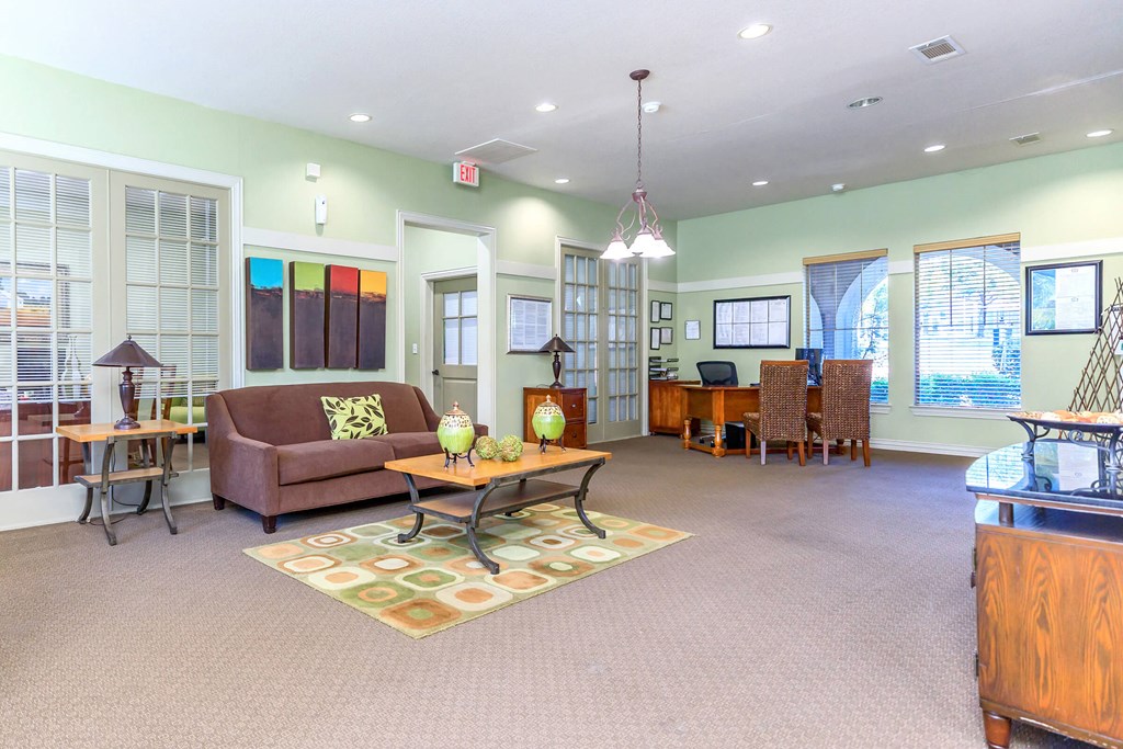 a living room with a couch and a table
