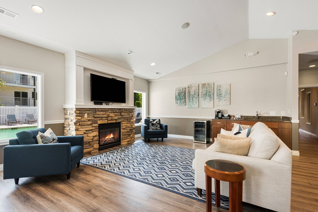 a living room with a fireplace and a couch