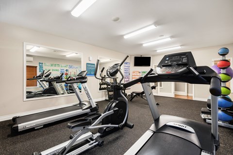 exercise equipment in the gym at meridian pointe apartments at Sage Apartments, Everett, 98204