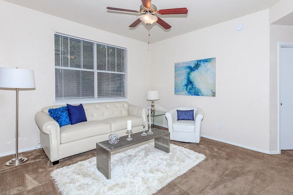 a living room with a couch and a coffee table