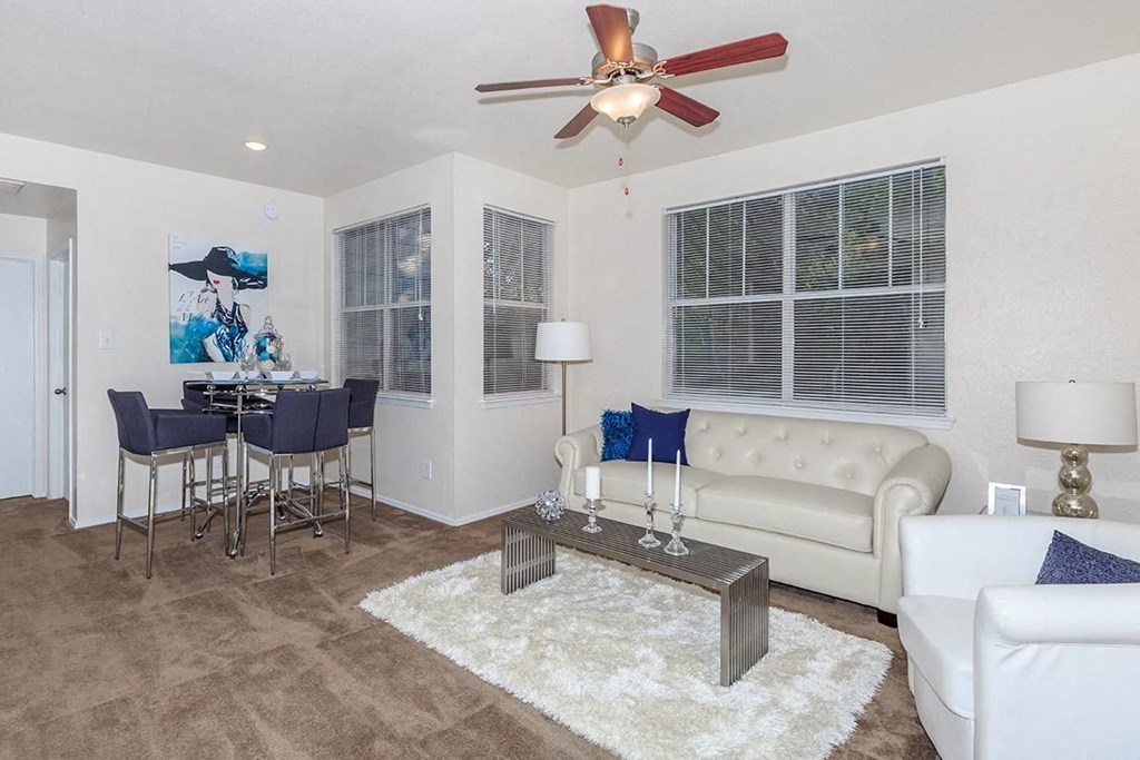 a living room with a couch and a table