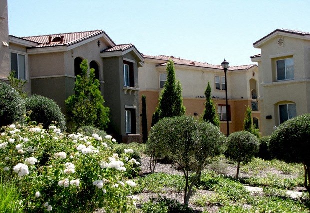 a house with a garden in front of it