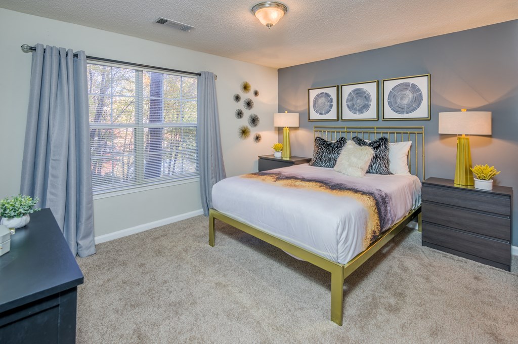 Bedroom with cozy bed at Elme Conyers Apartments, Conyers, GA, 30013