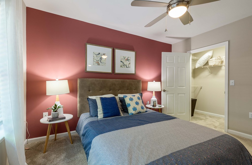 a bedroom with a bed and a ceiling fan at Elme Dulles, Herndon, VA