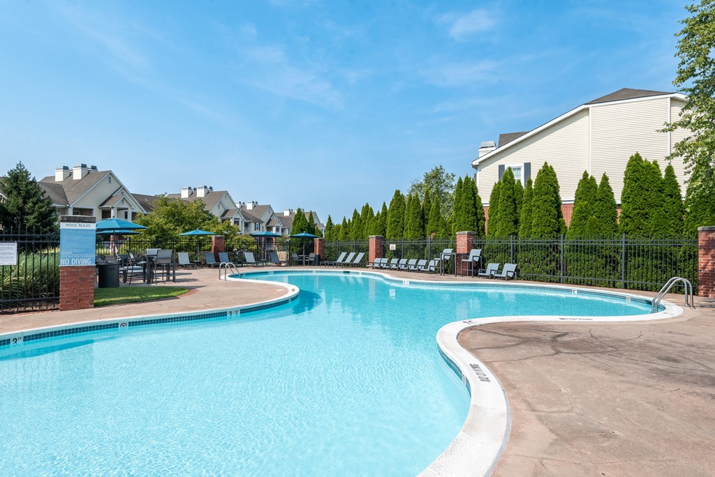 the resort style swimming pool at the falls at rollestone in rolling hill