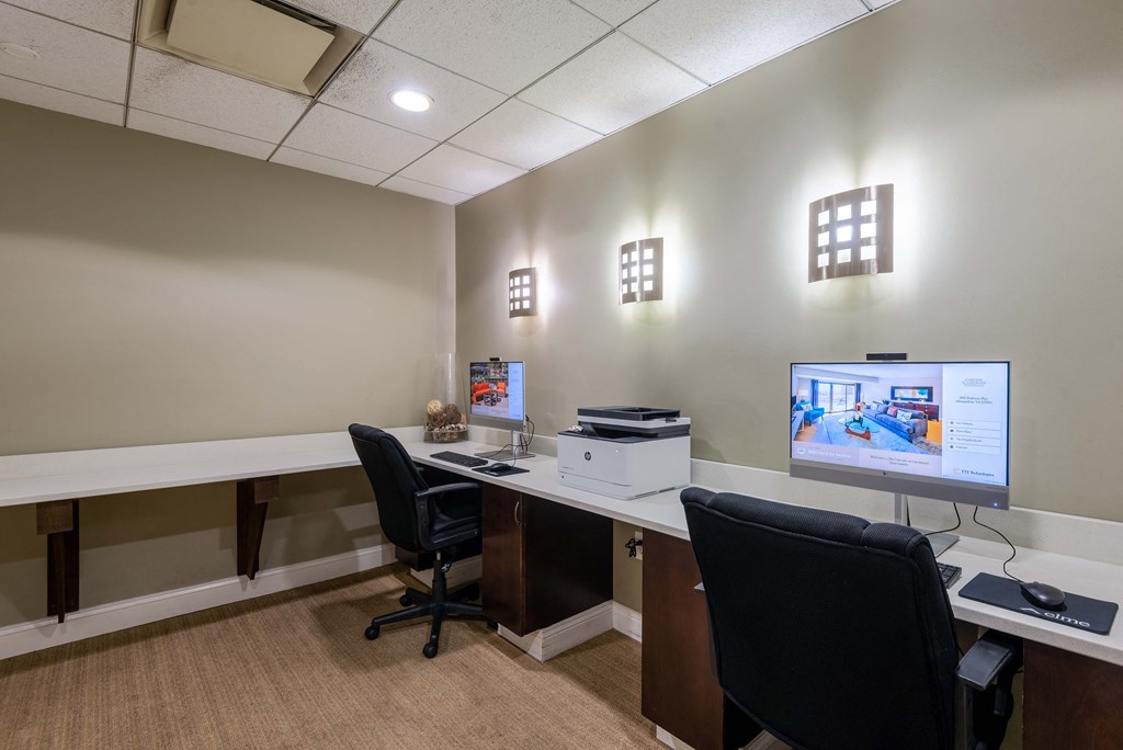 a home office with two desks and a computer at Cascade at Landmark, Virginia