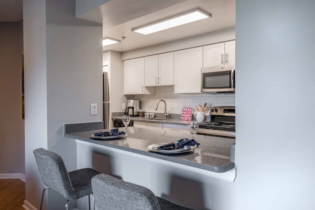kitchen with stainless steel appliances and white cabinets  at Cascade at Landmark, Alexandria, 22304