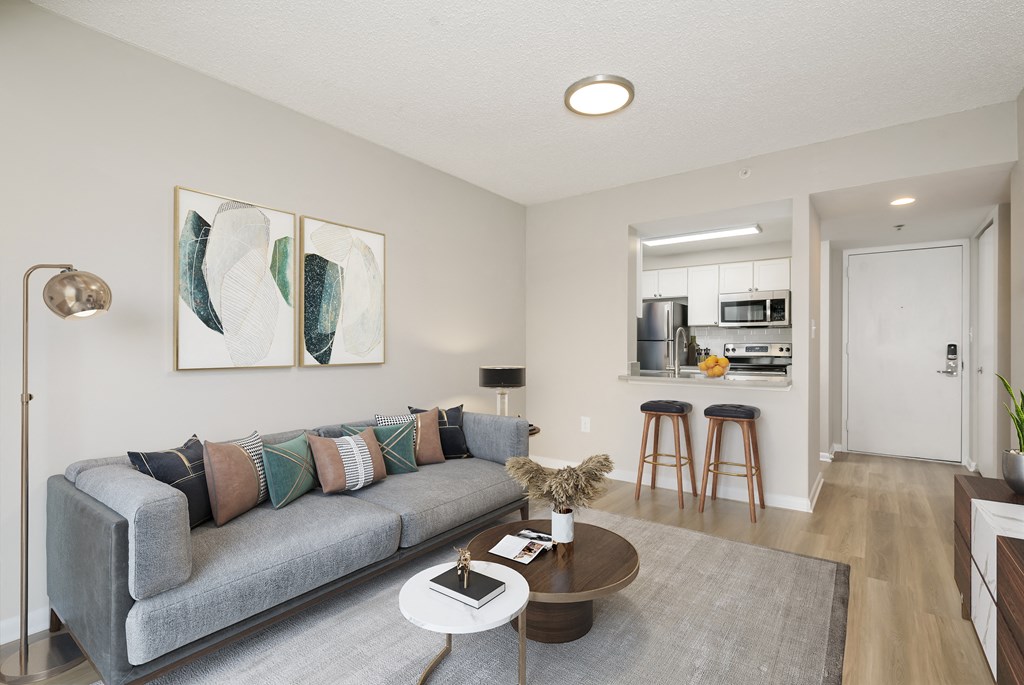 a living room with a couch and a coffee table at Cascade at Landmark, Alexandria, Virginia