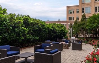 Courtyard with grill and fire pit at Bennett Park Apartments, Arlington, Virginia