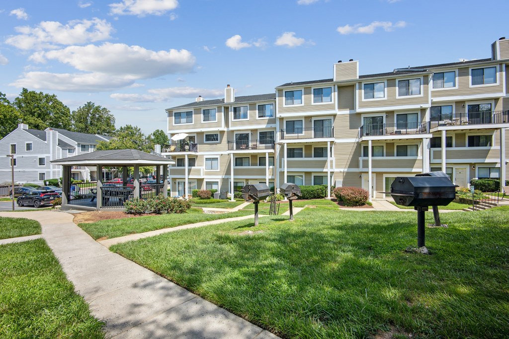 Apartment complex with a walkway in front at Elme Bethesda, Bethesda, 20814