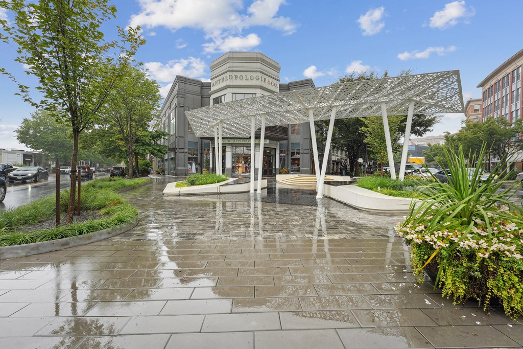 A building with a glass facade and a metal trellis structure in front at Elme Bethesda, Bethesda, 20814