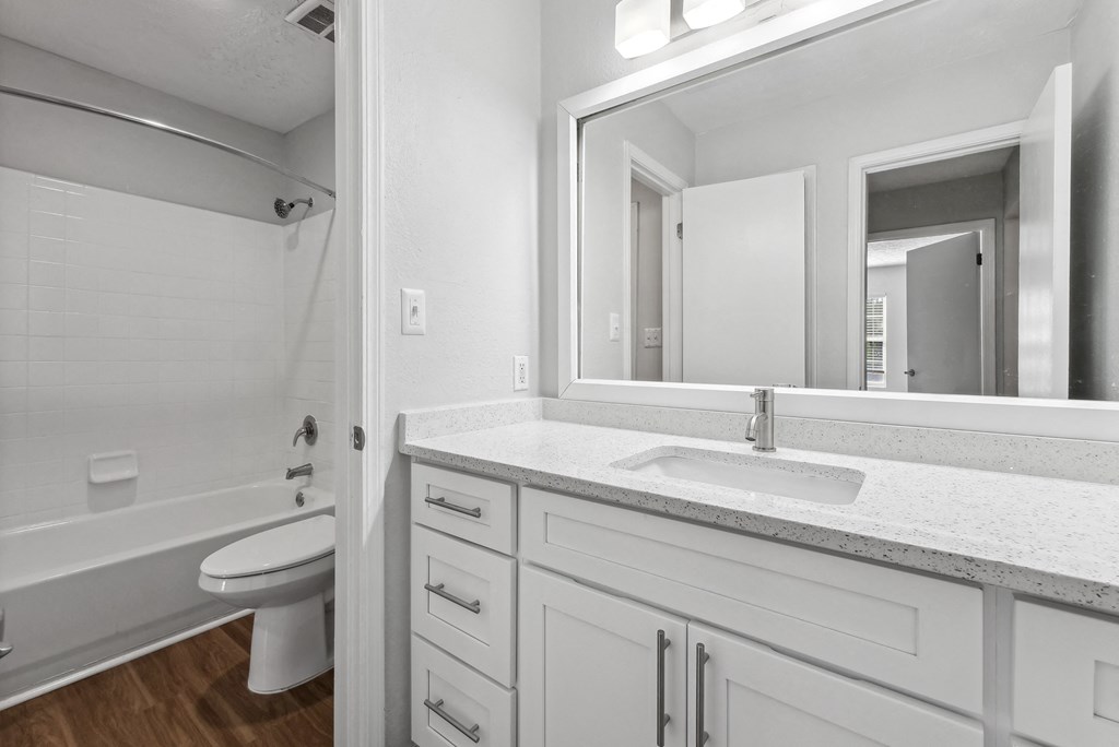 A white bathroom at Elme Sandy Springs Apartments, Atlanta, GA, 30350