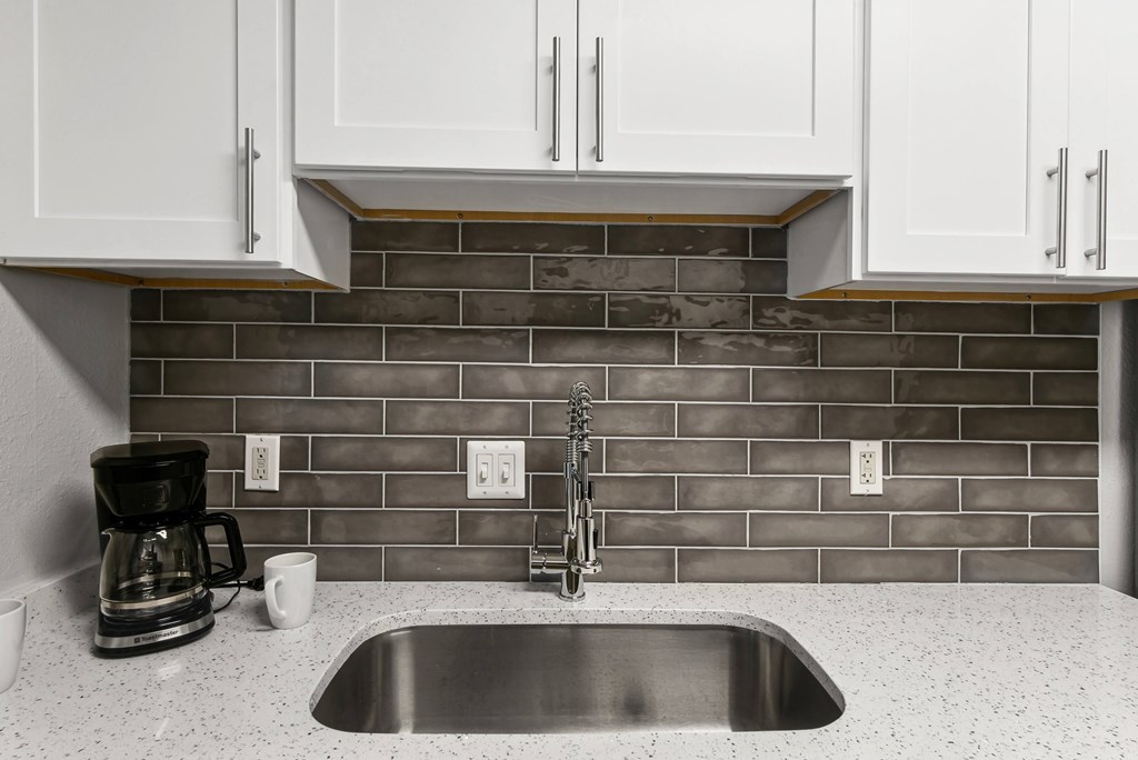 A kitchen at Elme Sandy Springs Apartments, Atlanta, GA, 30350