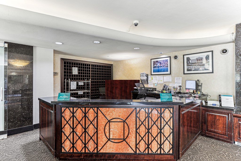 A reception desk with a black and orange design at 3801 Connecticut Avenue, Washington, 20008