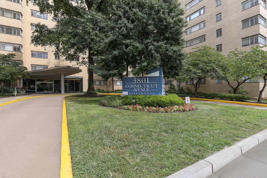 A sign that says Connecticut Avenue is in front of a building at 3801 Connecticut Avenue, Washington, 20008
