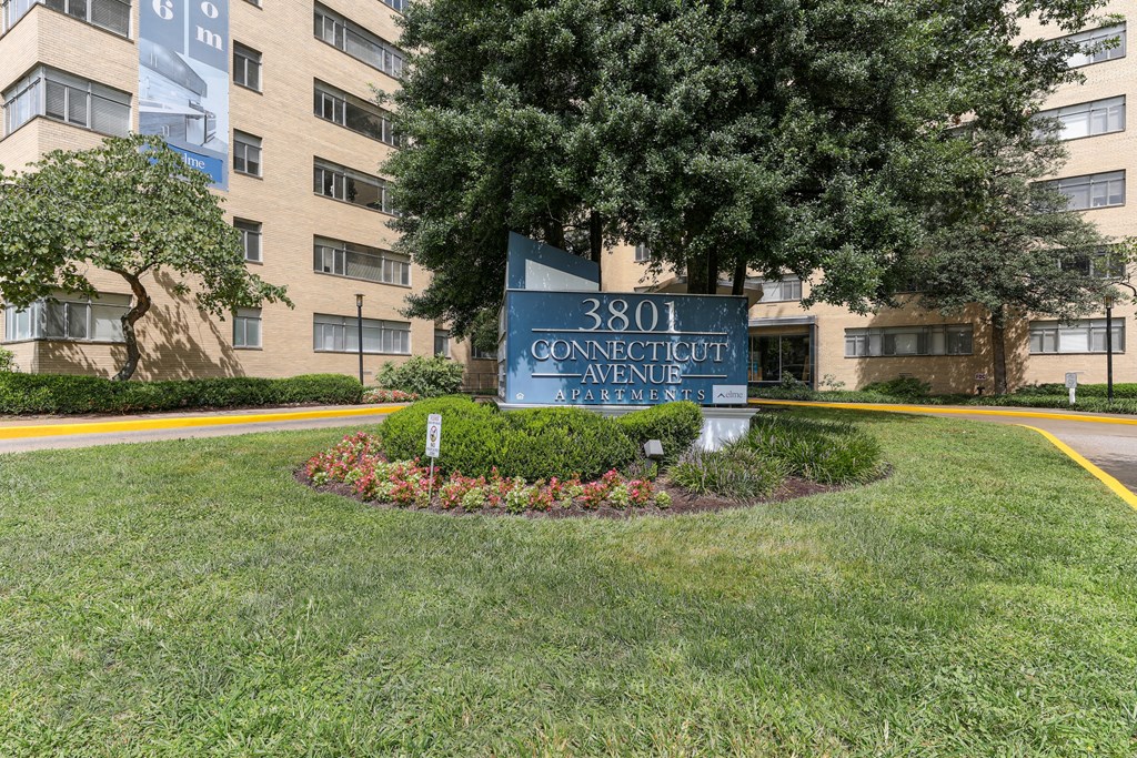 A sign for Connecticut Avenue is in front of a building at 3801 Connecticut Avenue, Washington, 20008